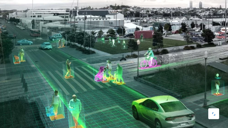 A digitalized street with cars, bikes and pedestrians.