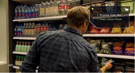 Picutre of a person in a grocery store looking at chips.