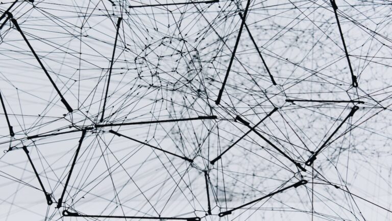 Web of wires forming geometric shapes.