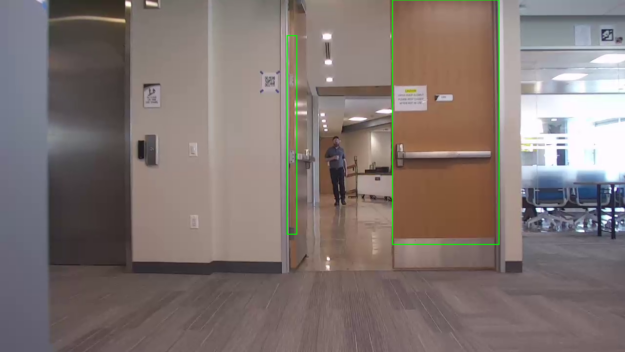 Indoor rooms and hallways with multiple doors and objects like chairs, desks, potted, ladder, elevator and potted plants showing final model’s accurate predictions of green bounding boxes.