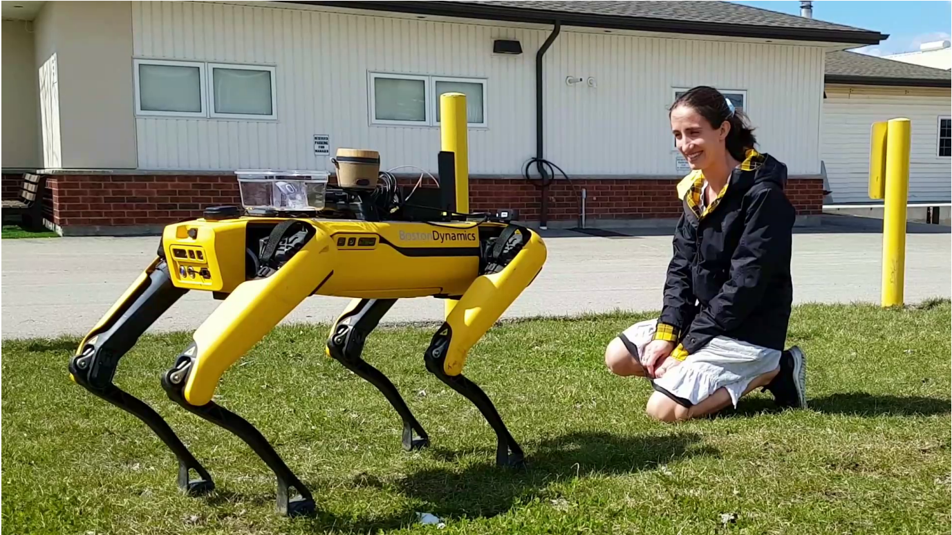 Photograph of Spot, an intelligent robotic system, after it has successfully completed a drink order.