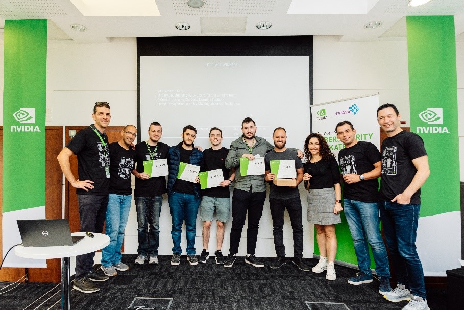 An image of the Hackathon judges standing with first place winners Team Yahalom holding their award