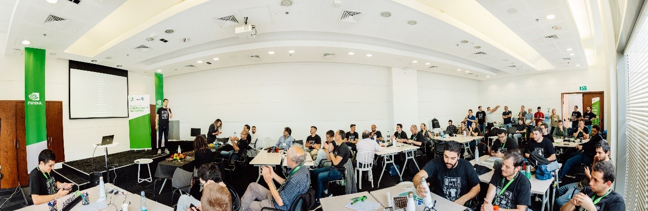 A picture of contestants sitting in a room for the winner announcement ceremony in NVIDIA Tel-Aviv  