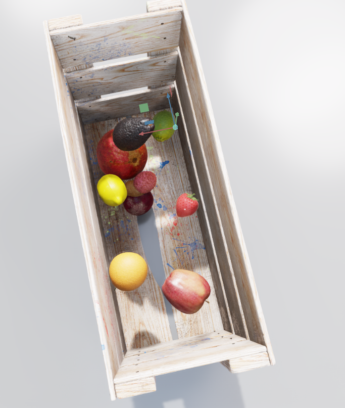 A bird’s-eye view of a crate with fruit randomization and the new addition of a strawberry.
