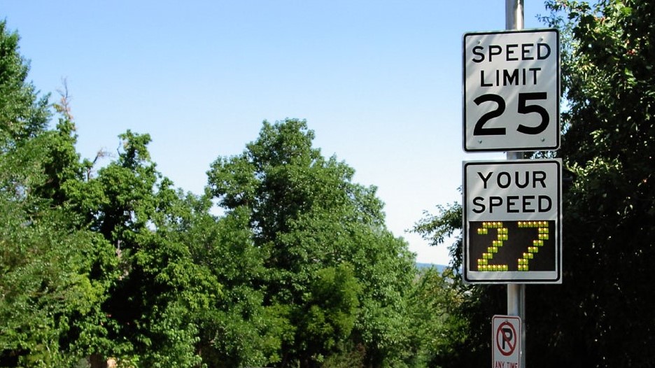 Picture of a 25 mph speed limit sign and actual speed of 27 mph displayed.
