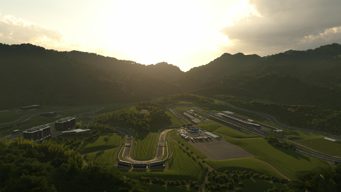 Screenshot of a racetrack in green fields, with trees, buildings, cars, and light from a setting sun.
