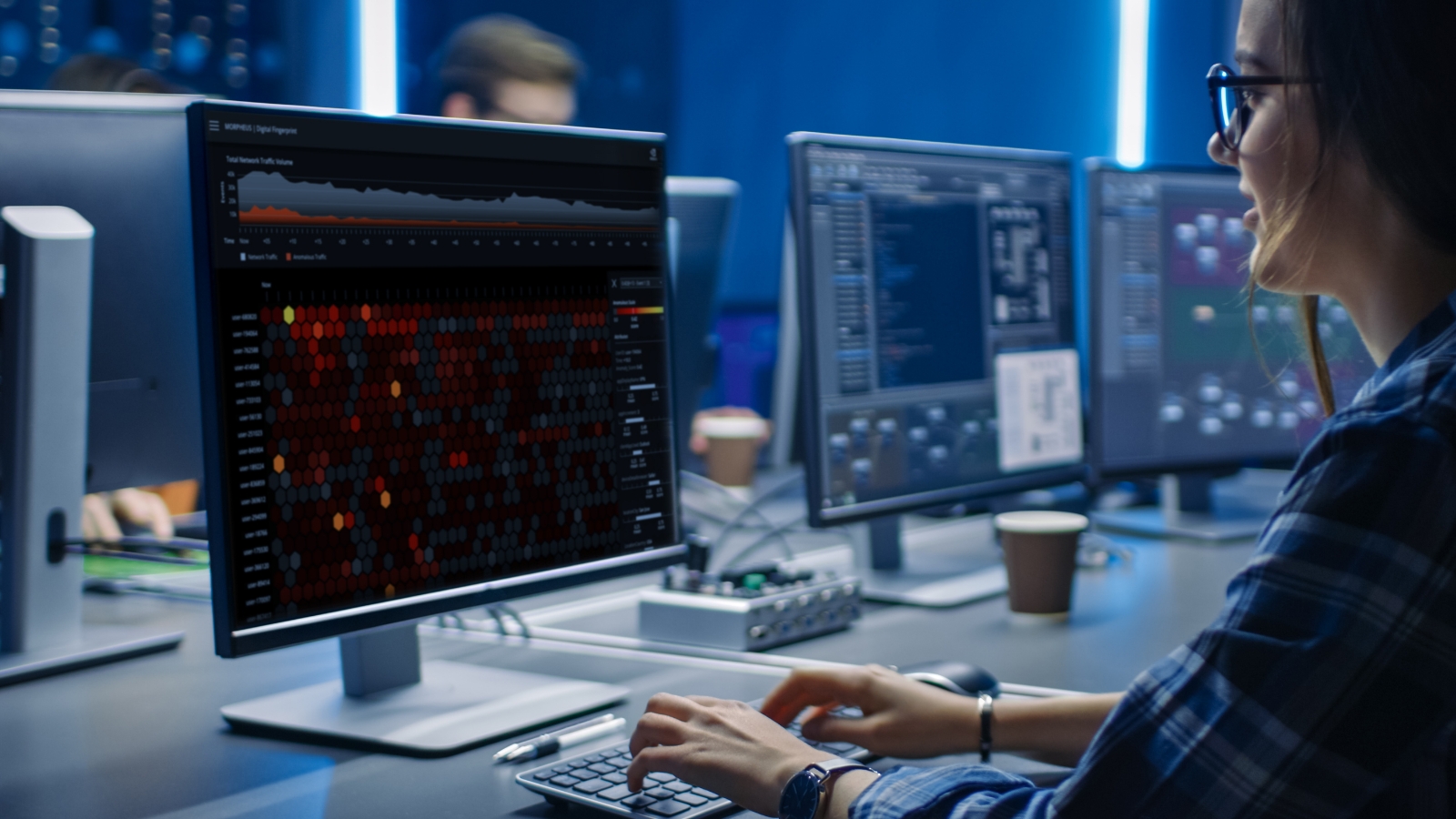 person typing at computer.