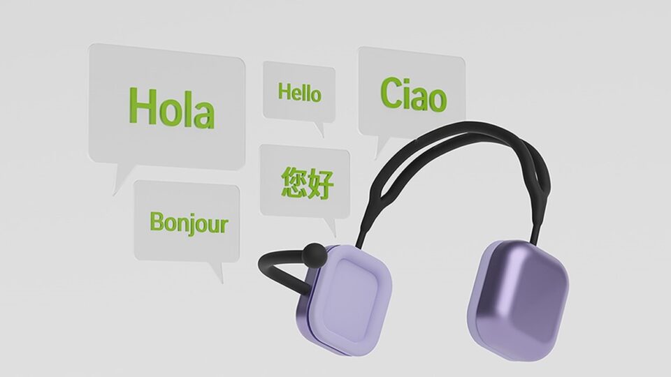 Image of headphones with speech bubbles saying hello in five languages.