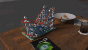 GIF of a marble rolling track.