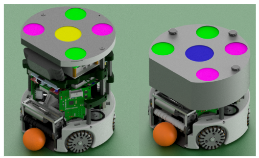 Two versions of the soccer-playing robot are shown. The one on the left is modified for the Vision Blackout Challenge, with an onboard camera and power supply board. The original robot appears on the right.
