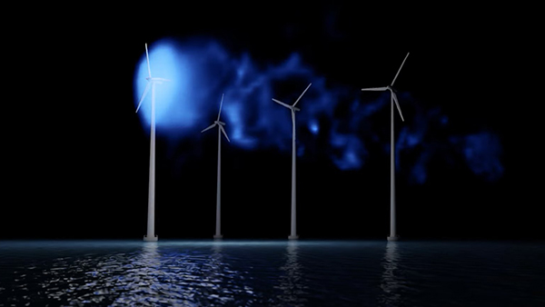 Image of windvanes over water at night.