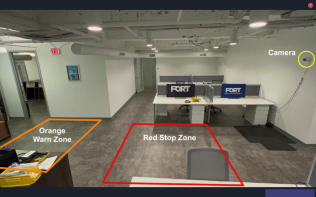 Photo of FORT robotics warn and stop zones labeled.
