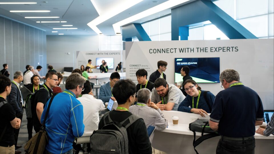 Picture of people at Connect with the Experts hall at NVIDIA GTC.